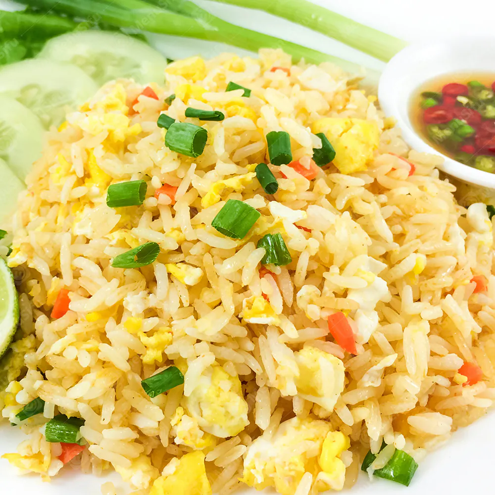 Fragrant fried rice with scrambled eggs, veggies & green onion garnish at China Wok, a Chinese Restaurant in Marion