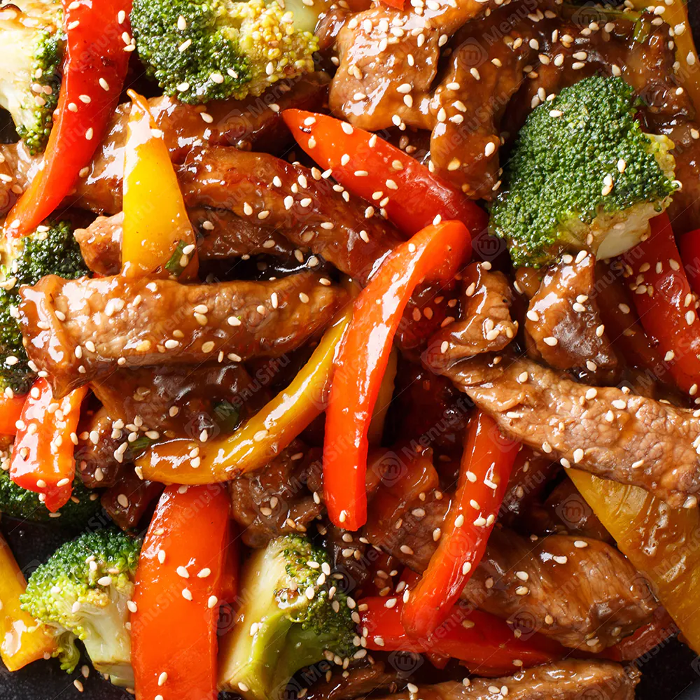 Tender beef strips with veggies, tossed in savory sauce & sesame seeds at China Wok, a Chinese Restaurant in Marion